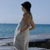 Lniana sukienka midi rozkloszowana flow – naturalny len